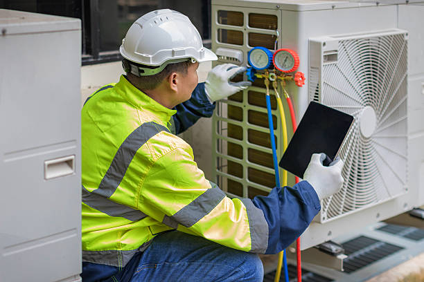 Professional Heat Pump Repair technician working in Pennville, PA